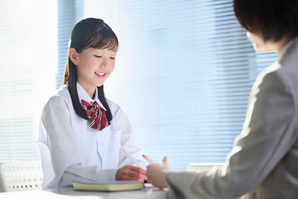英会話レッスンを受ける女性
